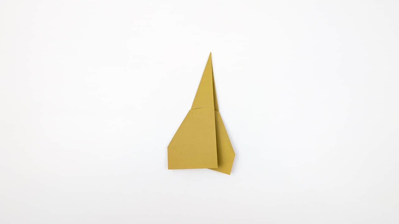 Look at the airplane from the front. Both wings should be symmetrical and level.