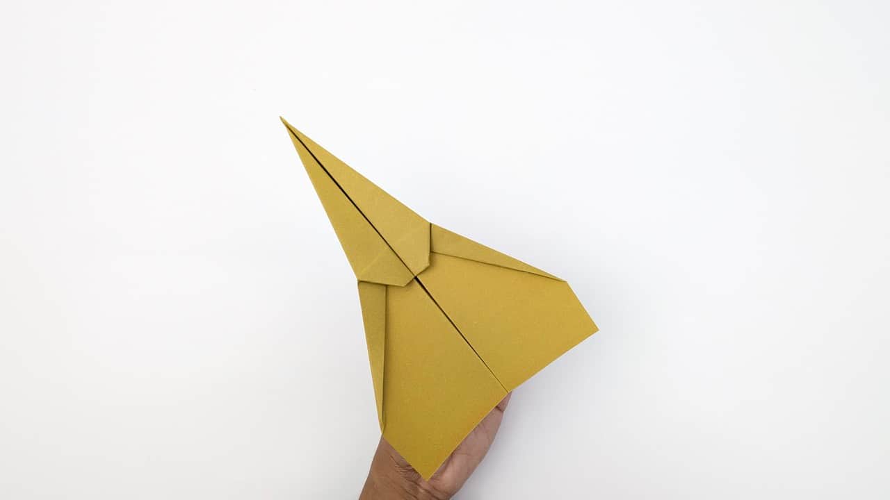 If it dives, bend the trailing edges up more. If it stalls, bend them down slightly. Adjust until it glides perfectly.