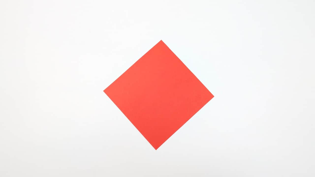 Start with a square sheet of paper, colored side up, placed as a diamond with one point toward you.