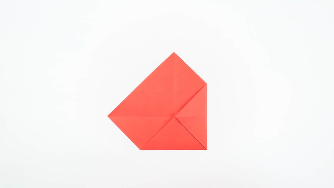 Fold all four corners to the center one more time.